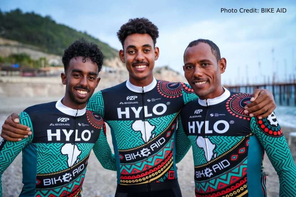 Eritrean riders with Team BIKE AID: Photo: Yoel Habteab (left) and Dawit Yemane (right) with their fellow countryman Milkias Maekele